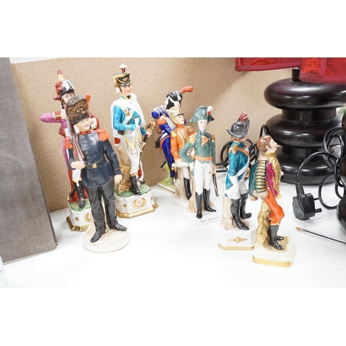 573 - A group of thirteen naval/military figures, tallest 32cm high