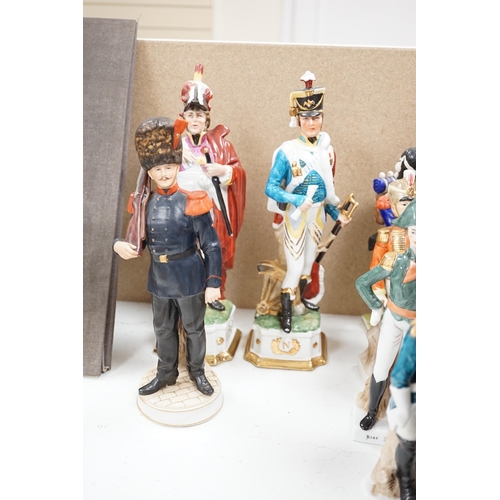 573 - A group of thirteen naval/military figures, tallest 32cm high