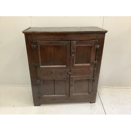 58 - A late 17th century oak two door cupboard, width 106cm, depth 48cm, height 118cm