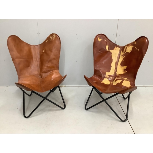 61 - A pair of Vida faux hide butterfly chairs width 60cm, depth 60cm, height 95cm