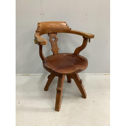 69 - A Victorian walnut swivel desk chair, width 61cm, depth 50cm, height 86cm