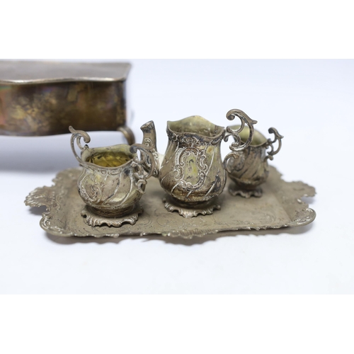 850 - A German Hanau white metal miniature tea set and tray, tray 18.2cm, together with a George V silver ... 