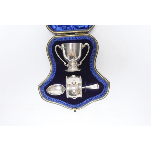 852 - A cased Edwardian matched silver christening pair, (egg cup and napkin ring), Wakeley & Wheeler, Lon... 