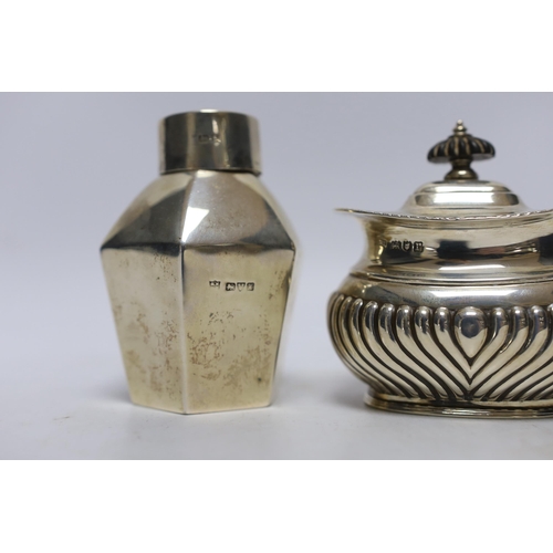 858 - An Edwardian silver hexagonal tea caddy, by Nathan & Hayes, Chester, 1908, 97mm and one other demi-f... 