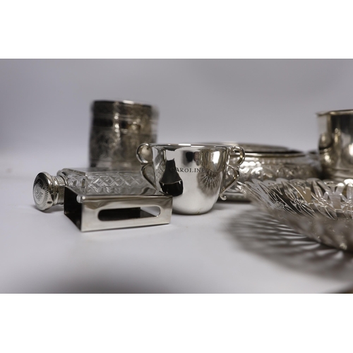 860 - A group of silver and a white metal items including two Middle Eastern ring vases, two foliate dishe... 