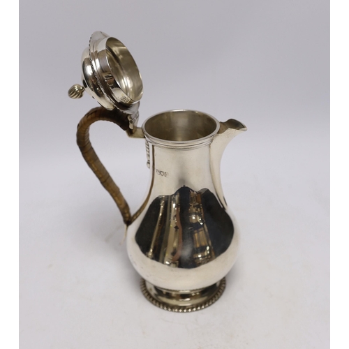 879 - An Edwardian silver baluster hot water pot, London, 1905, height 21cm, gross weight 14.7oz.