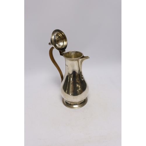 880 - A George V silver baluster hot water pot by Mappin & Webb, London, 1919, height 25.5cm, gross weight... 