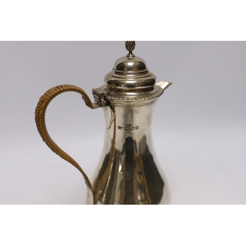 880 - A George V silver baluster hot water pot by Mappin & Webb, London, 1919, height 25.5cm, gross weight... 