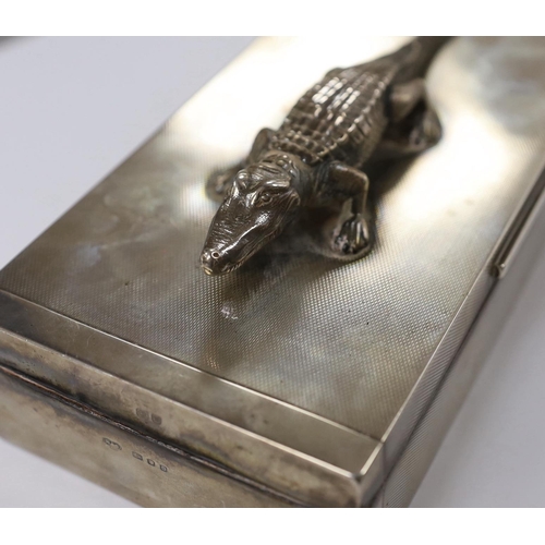 887 - A George VI part engine tuned silver mounted rectangular cigarette box, with white metal crocodile s... 