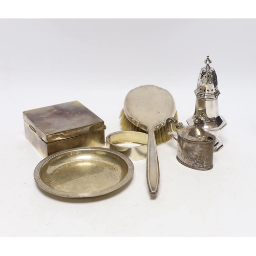 894 - Sundry silver including a mounted hair brush, cigarette box, small dish, bangle, caster and mustard.... 