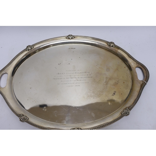 896 - A George V silver oval presentation tea tray, with inset handles, Walker & Hall, Sheffield, 1935, 49... 