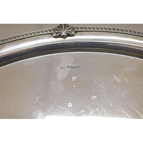 896 - A George V silver oval presentation tea tray, with inset handles, Walker & Hall, Sheffield, 1935, 49... 