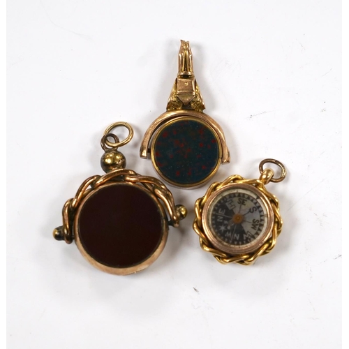 912 - Three late Victorian carnelian set fob seals including 18ct rolled gold, largest 3mm.