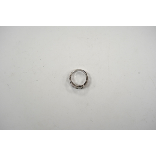 924 - A modern pierced white metal (stamped PT900) and solitaire diamond set ring, size K, gross weight 6.... 