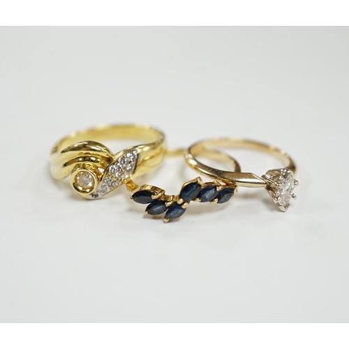 928 - Three assorted modern 14k and gem set rings, including single stone marquise cut diamond, diamond ch... 