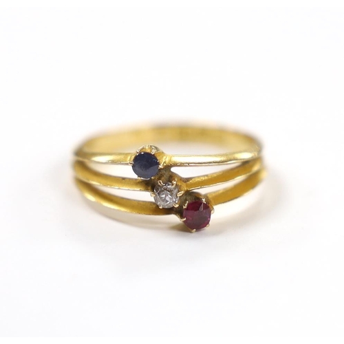 938 - A late Victorian 18ct gold, sapphire ruby and diamond set three stone triple shank ring, size N, gro... 