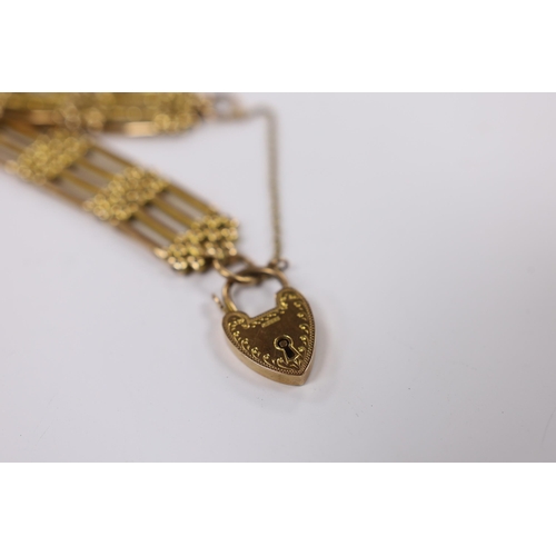 942 - An early 20th century 9ct gate link bracelet, with heart shaped padlock clasp, 18cm 26.6 grams.... 