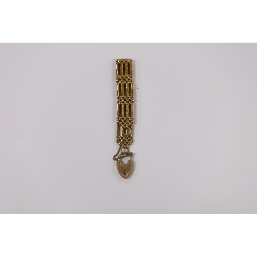 942 - An early 20th century 9ct gate link bracelet, with heart shaped padlock clasp, 18cm 26.6 grams.... 