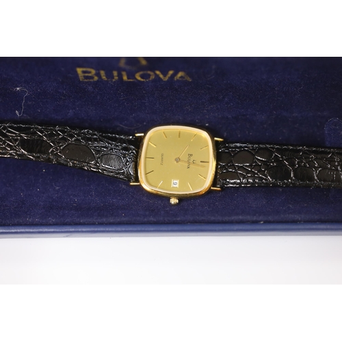 948 - A gentleman's Raymond Weil 18k gold plated quartz dress wrist watch, a similar Bulova steel and gold... 