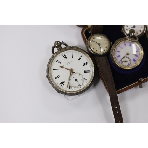 955 - A late Victorian silver open face pocket watch, retailed by Kendall & Dent, a cased Swiss 935 standa... 