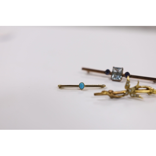 961 - An Edwardian 9ct gold and seed pearl set swallow bar brooch, 43mm, a 9ct gold and turquoise set tie ... 