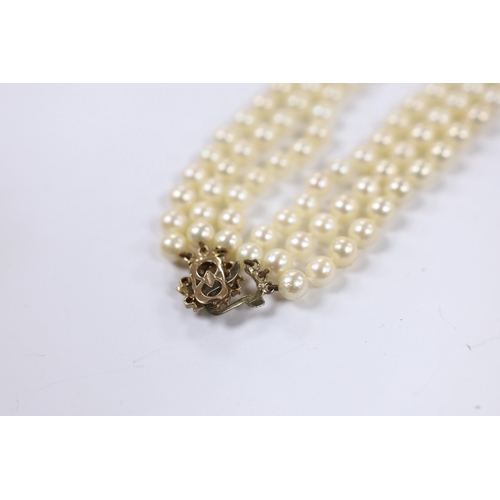 967 - A triple strand cultured pearl choker necklace, with cultured pearl and garnet cluster set 9ct gold ... 