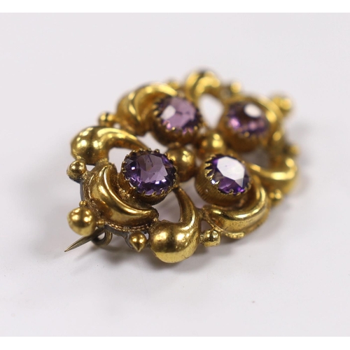 968 - A late Victorian yellow metal and amethyst cluster set oval brooch, 45mm, gross weight 7.2 grams.... 