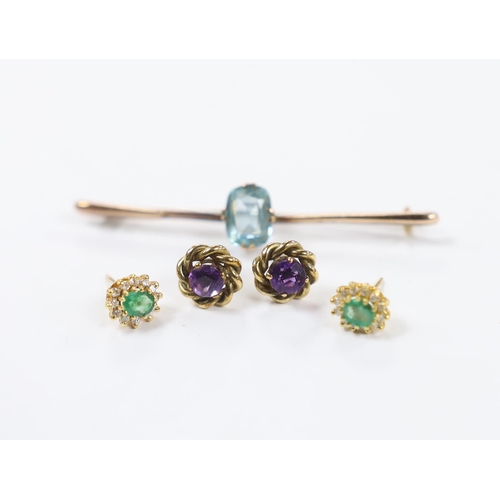 973 - A pair of 18ct gold, emerald and diamond set oval cluster ear studs, one other pair of ear studs and... 