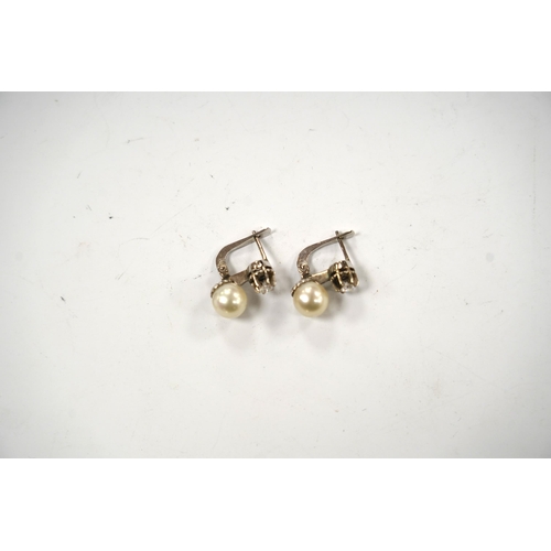 977 - A pair of white metal, single stone cultured pearl and single stone diamond set earrings, 16mm, gros... 