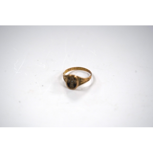 980 - A Victorian 15ct  gold black enamel and seed pearl set mourning ring, size Q, gross weight 2.3 grams... 