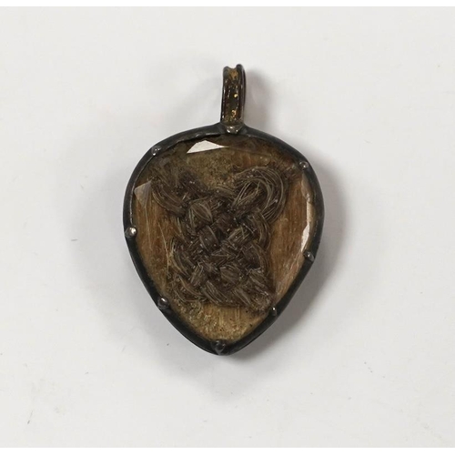 981 - An 18th century gilt metal heart shaped mourning pendant, with engraved inscription, 'CARna DERBY DI... 