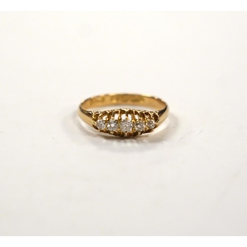 987 - An Edwardian 18ct gold and graduated five stone set diamond ring, size M, gross weight 3 grams.... 