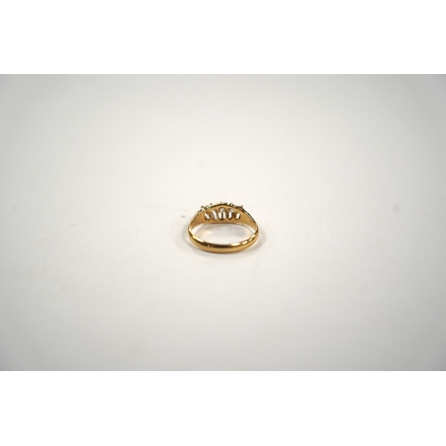 987 - An Edwardian 18ct gold and graduated five stone set diamond ring, size M, gross weight 3 grams.... 