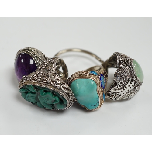 996 - Four assorted Chinese white metal filigree and gem set rings, including turquoise and amethyst.... 