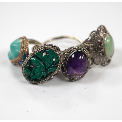 996 - Four assorted Chinese white metal filigree and gem set rings, including turquoise and amethyst.... 