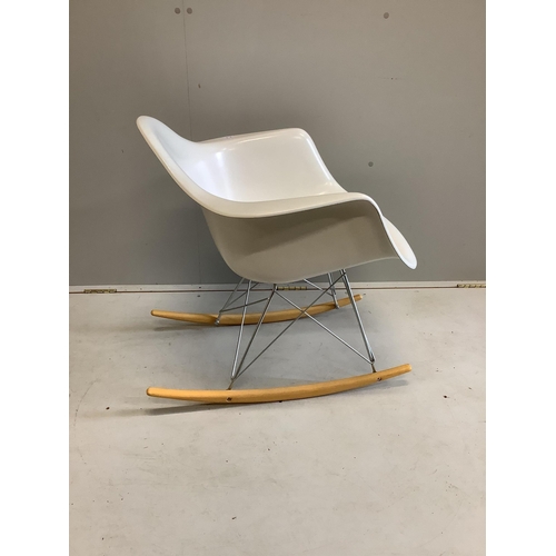 1005 - A Vitra Eames rocking chair, purchased from Skandium, width 63cm, depth 68cm, height 67cm