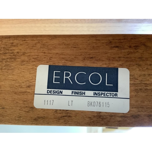 1060 - A modern Ercol elm dining table, width 110cm, depth 98cm, height 72cm (lacks spare leaf)