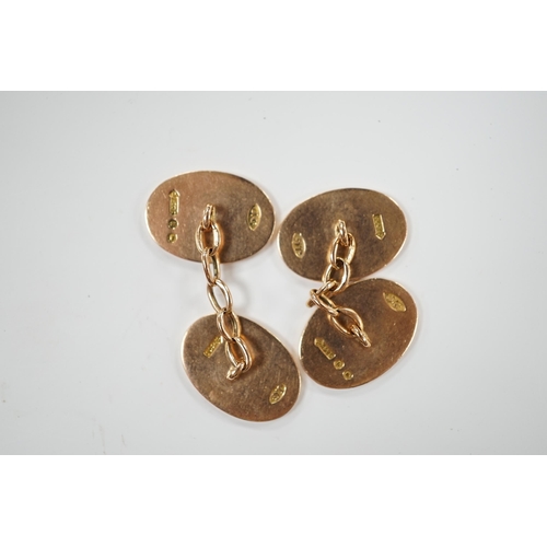 1959 - A pair of George V 9ct gold oval cufflinks, with engraved monogram, 11.8 grams.