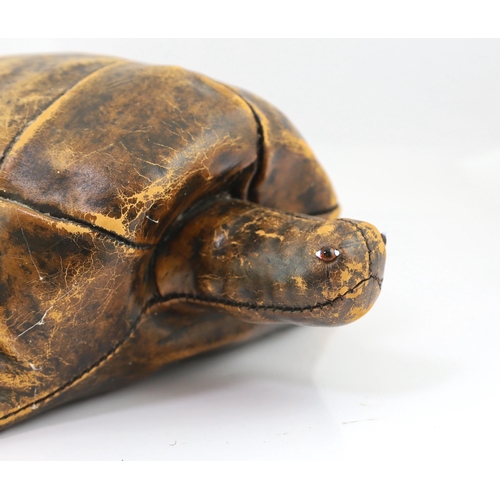 1 - Omersa for Liberty & Co., a brown leather model of a tortoise with glass beaded eyes, 54cm long, 18c... 