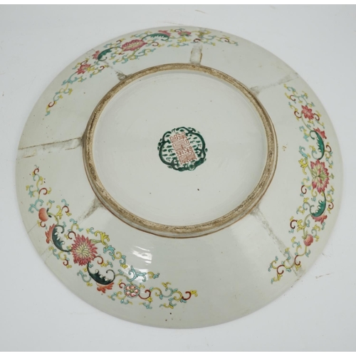 103 - A Chinese yellow ground dragon dish, late 19th century, painted with a five claw dragon chasing a ... 