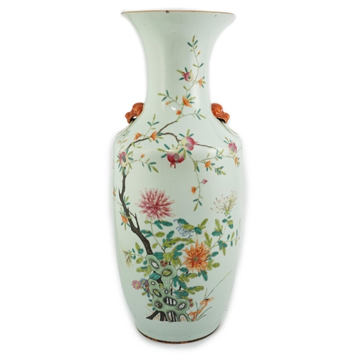 104 - A large Chinese famille rose vase, 19th century, painted with chrysanthemums, pomegranates, rockwork... 