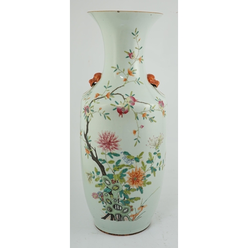 104 - A large Chinese famille rose vase, 19th century, painted with chrysanthemums, pomegranates, rockwork... 