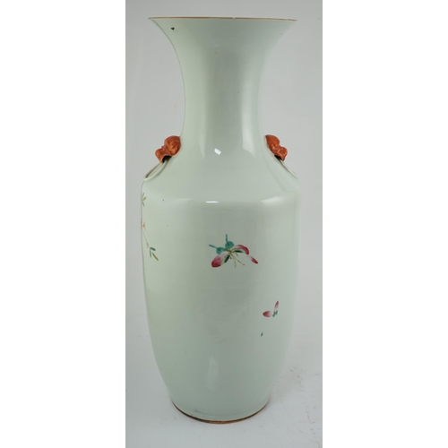 104 - A large Chinese famille rose vase, 19th century, painted with chrysanthemums, pomegranates, rockwork... 