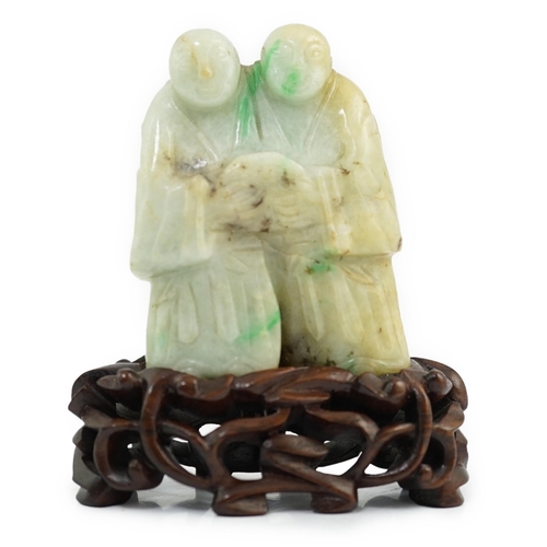 120 - A Chinese jadeite group of the He He Erxian, 19th century, the twins standing shoulder to shoulder a... 