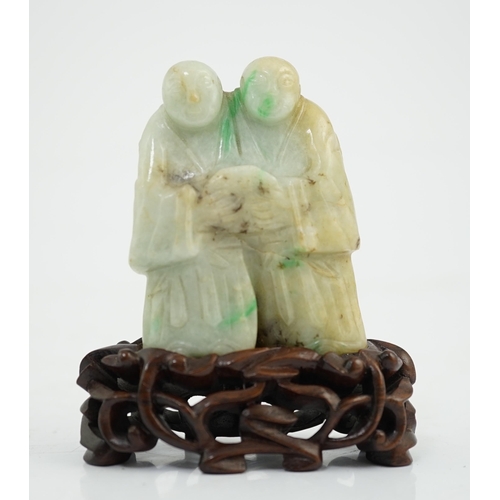 120 - A Chinese jadeite group of the He He Erxian, 19th century, the twins standing shoulder to shoulder a... 