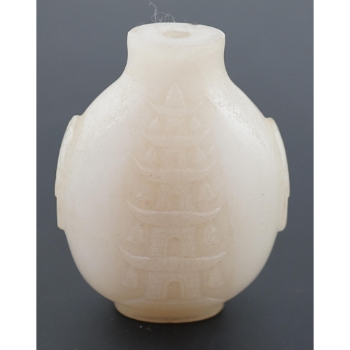 126 - A large Chinese white jade snuff bottle, 19th century, carved in relief with a horse biting leaves f... 