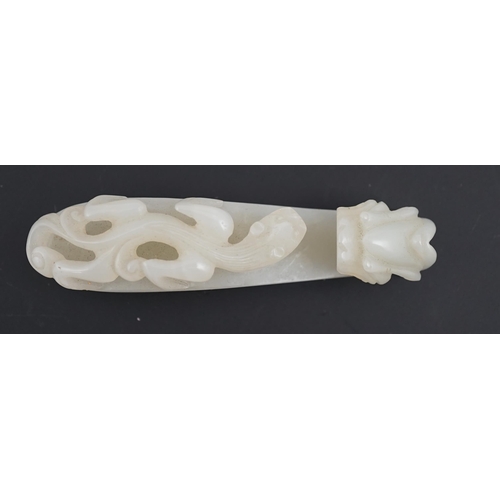 127 - A Chinese white jade dragon belt hook, 18th/19th century, carved in relief and openwork with a chi... 