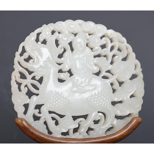 128 - A Chinese white jade qilin and rider plaque, 18th/19th century, carved and pierced to each side wi... 