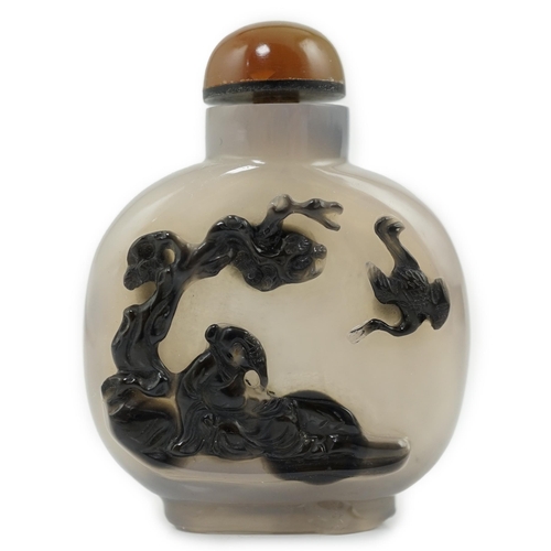 134 - A Chinese cameo agate sage and crane snuff bottle, 19th century, well hollowed, the carver skilful... 