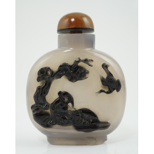 134 - A Chinese cameo agate sage and crane snuff bottle, 19th century, well hollowed, the carver skilful... 